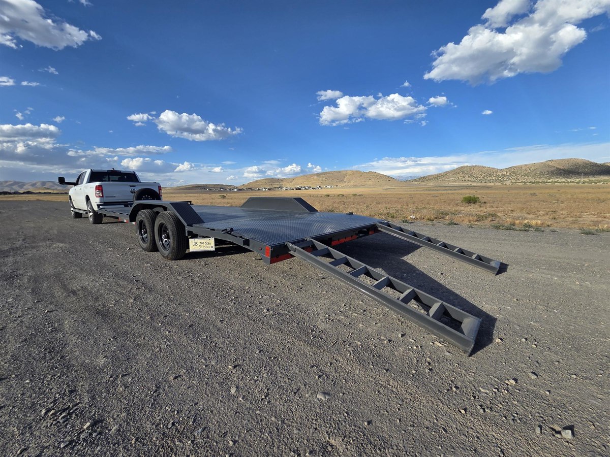 Car hauler trailer rear view with ramps out