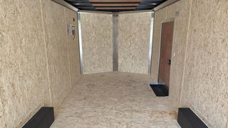 Interior front corner with side door and engineered wood floor