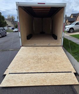 Rear ramp down with extension flap on the enclosed car hauler