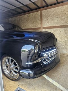 Custom 1950 Mercury lead sled loaded and strapped inside the 24ft enclosed trailer