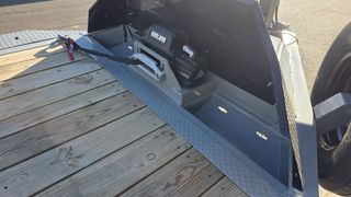 Apex 12,000 lb winch with wireless remote mounted on the deck