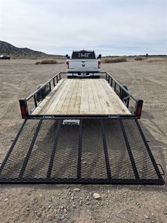 Utility trailer rear ramp gate down